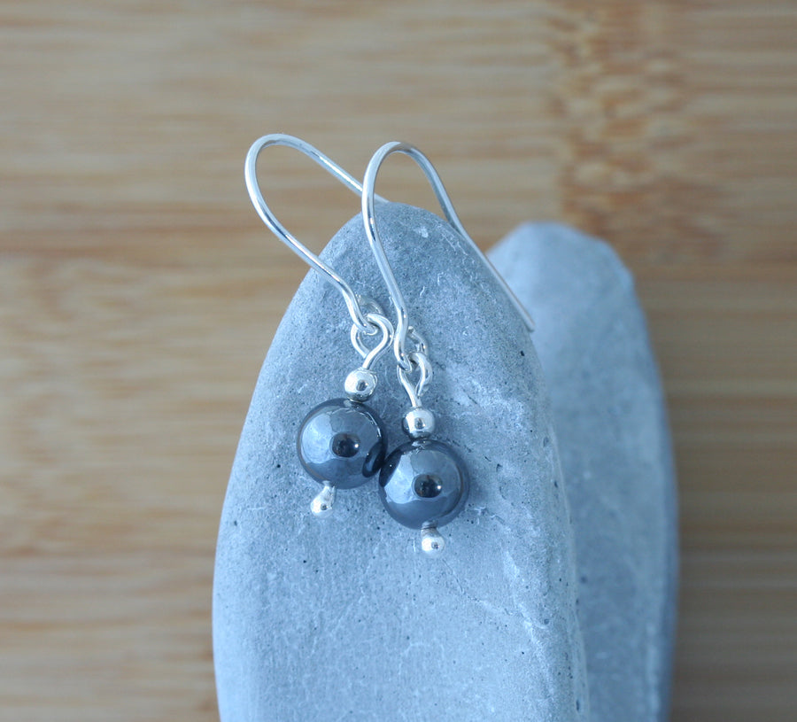 Hematite dangle earrings in sustainable sterling silver. Handmade in New Jersey, US.
