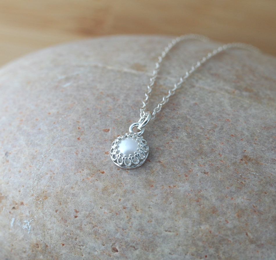 Minimalist pearl crown princess pendant necklace in sustainable sterling silver. Handmade in New Jersey, US. June birthstone pendant necklace.