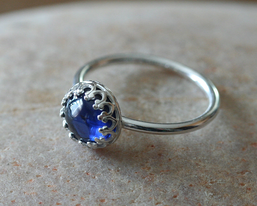 Minimalist ethical blue sapphire princess crown ring in sustainable sterling silver. Handmade in New Jersey, US.