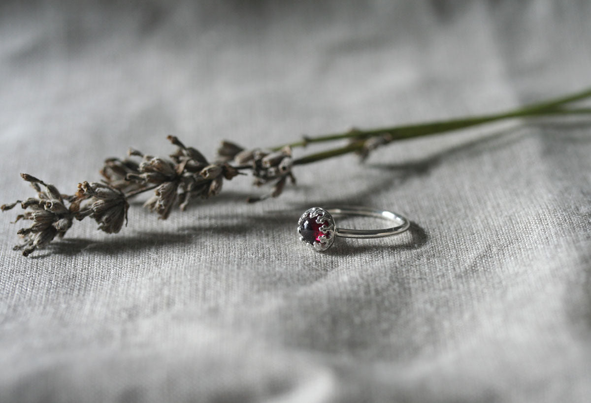 Garnet crown ring in sterling silver. Handmade with ethical sterling silver in New Jersey, US.
