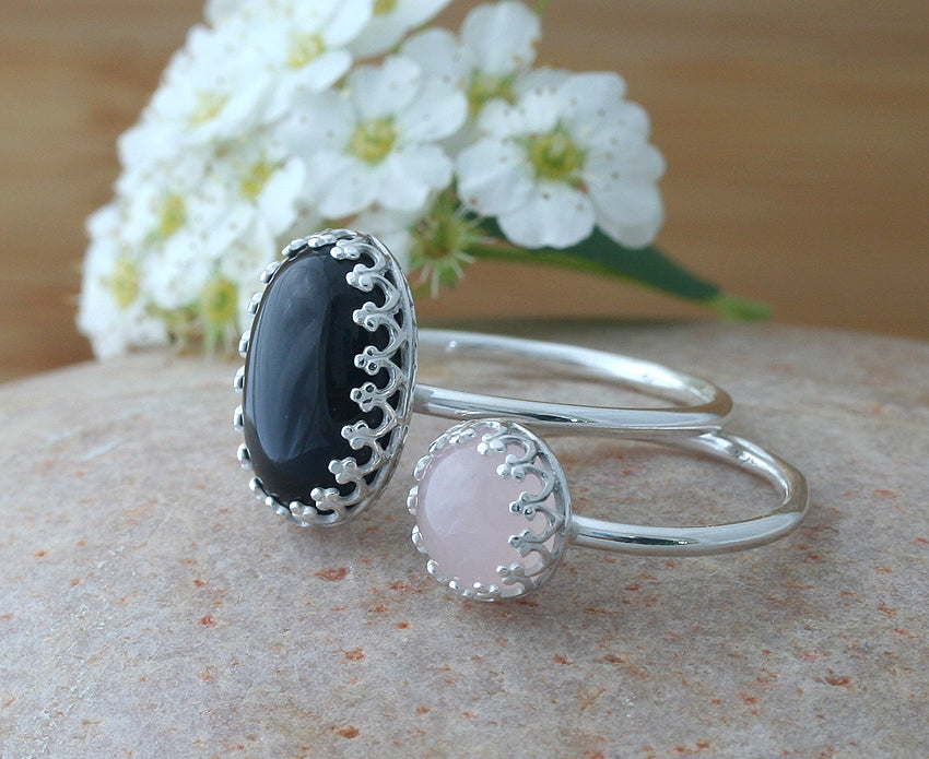 Rose quartz and black onyx princess crown rings in sustainable sterling silver. Handmade in New Jersey, US.