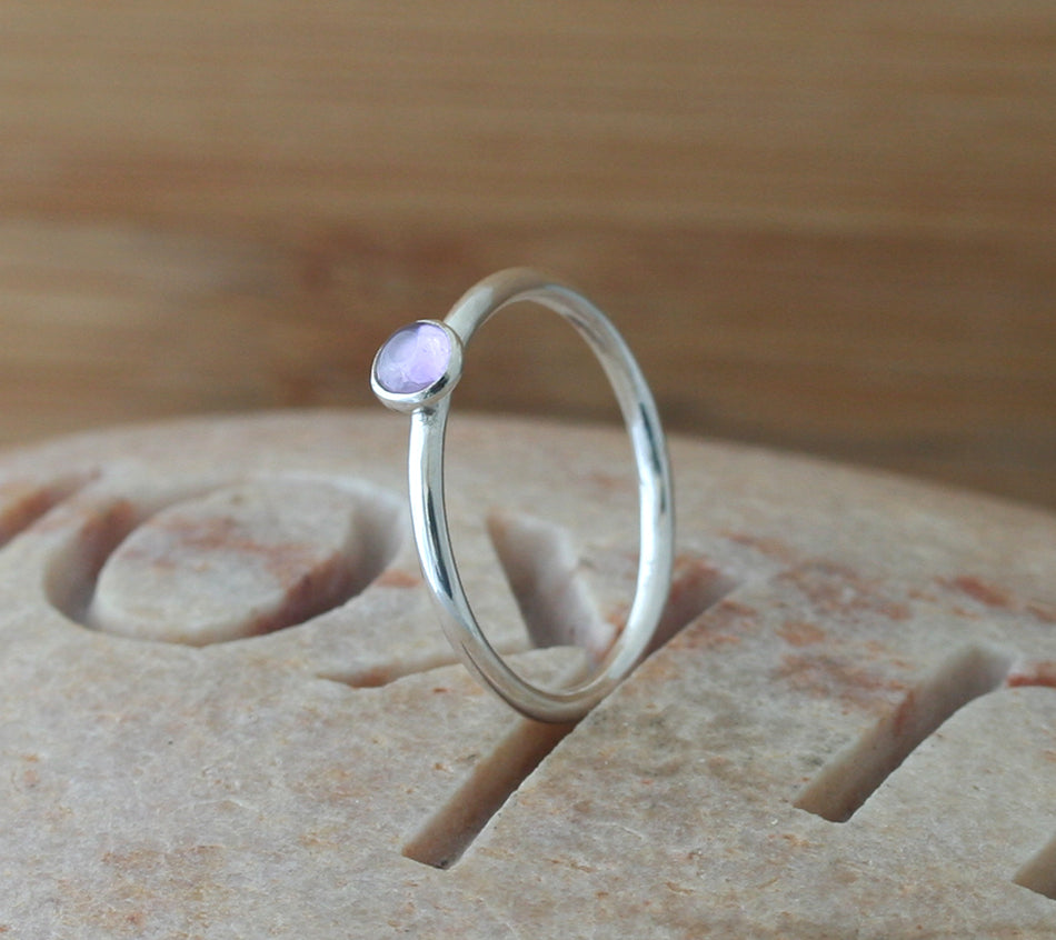 Light amethyst ethical stacking ring in sterling silver. Handmade in the US.