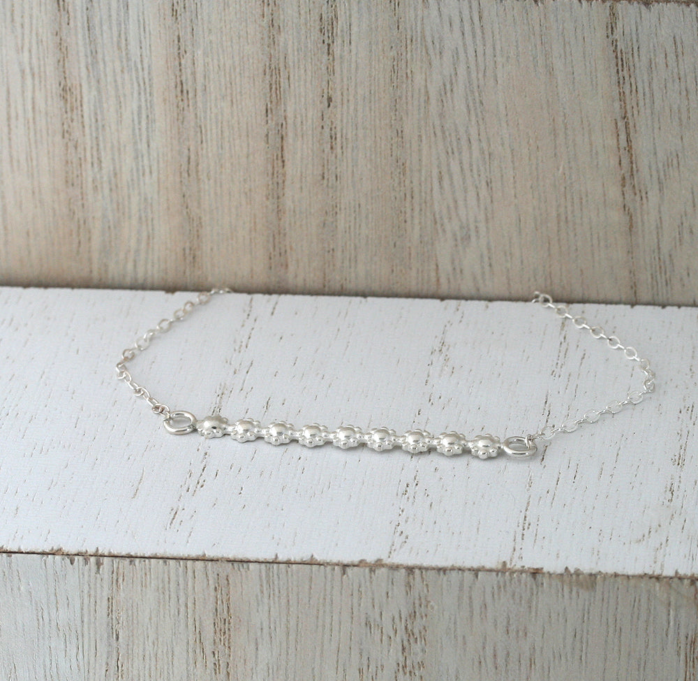 Daisy Flower Bar Necklace in Sterling Silver.