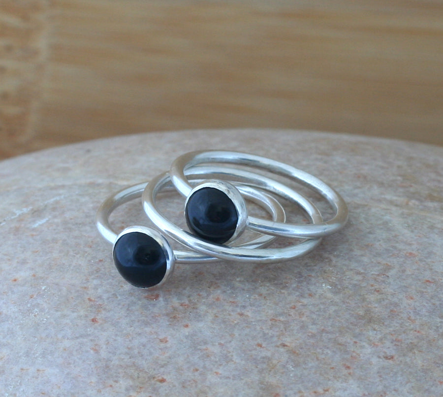 Black onyx stacking rings . Handmade in New Jersey with sustainable silver. Scandinavian design