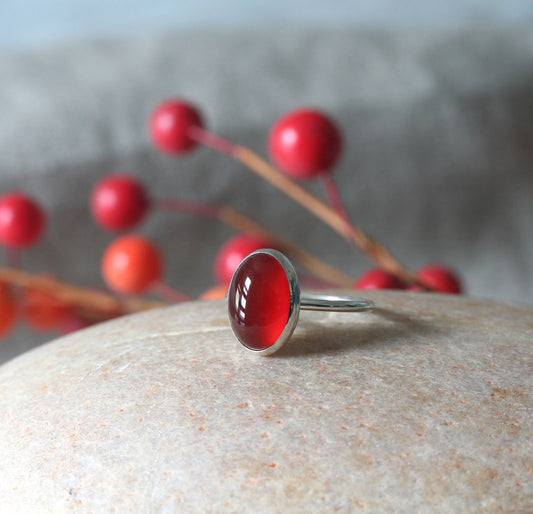 Oval classic carnelian ring handmade with sustainable silver in New Jersey.  Matching nail art.