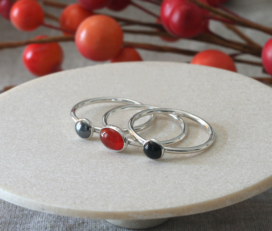 Classic carnelian, black onyx and hematite stacking rings in sustainable sterling silver. 