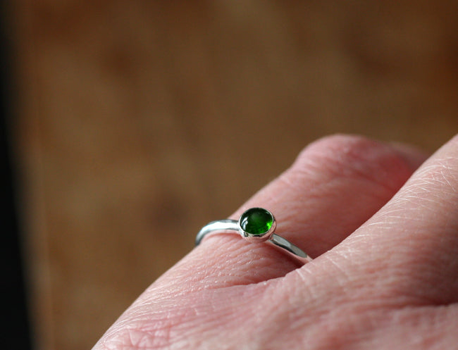 Green Diopside stacking ring made in sustainable sterling silver with hammered band on finger. Handmade in New Jersey, US.