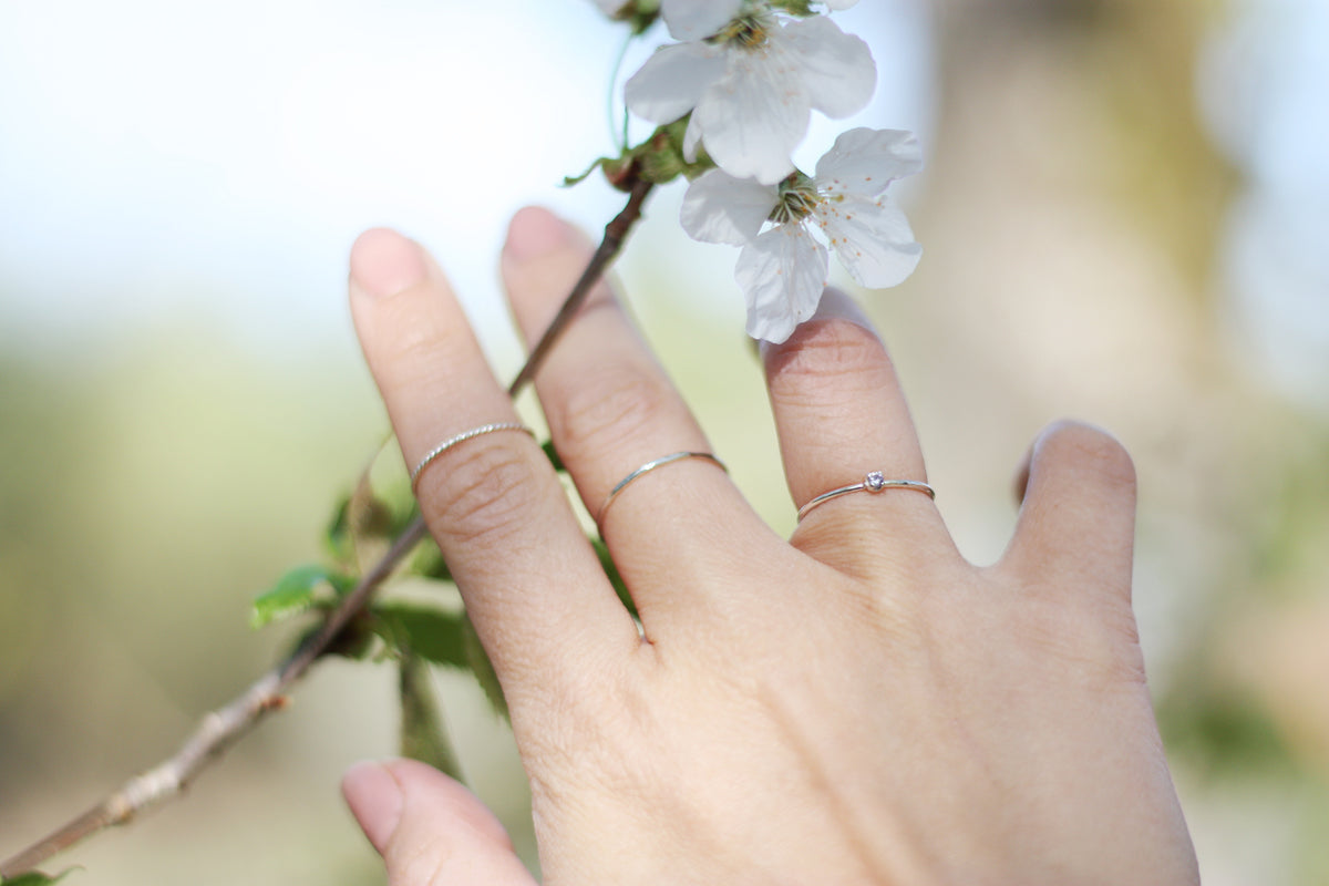 Thin stacking rings in sustainable silver. Handmade in New Jersey, US.