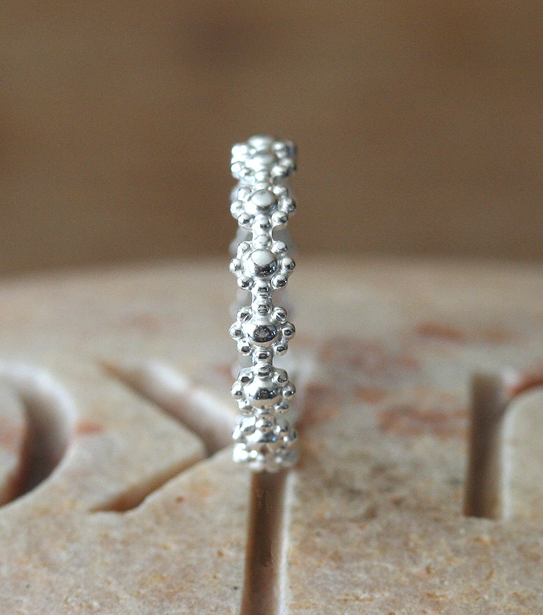 Daisy flower ring in sustainable sterling silver. Handmade in New Jersey, US.