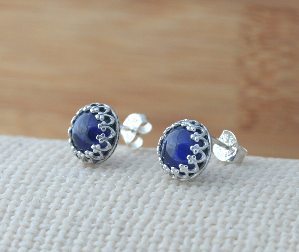 Ethical blue sapphire crown earrings in sterling silver. Handmade in the US.