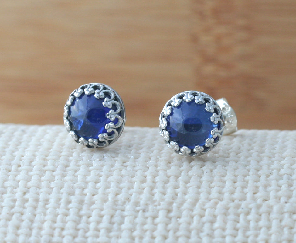 Ethical blue sapphire crown earrings in sustainable sterling silver. Handmade in the US.