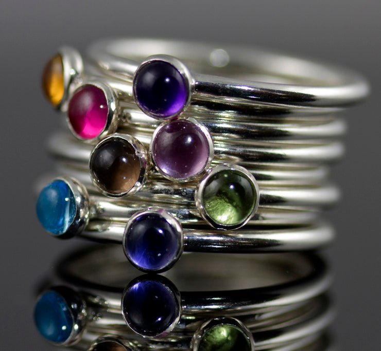 Minimalist birthstone stacking rings in sustainable sterling silver. Handmade in New Jersey, US.