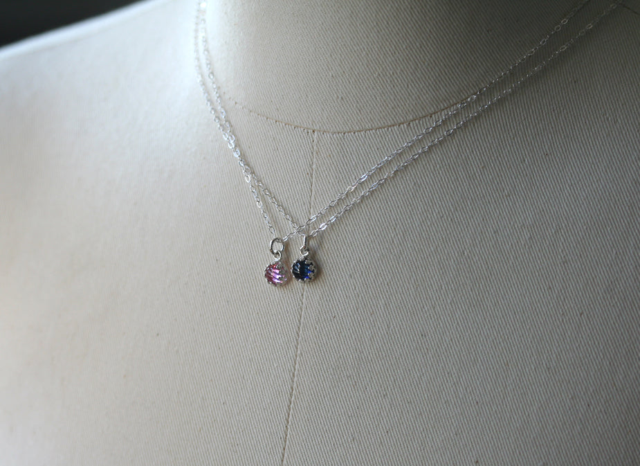 Small pink sapphire princess crown necklace in sustainable sterling silver. Ethical. Handmade in New Jersey, US.