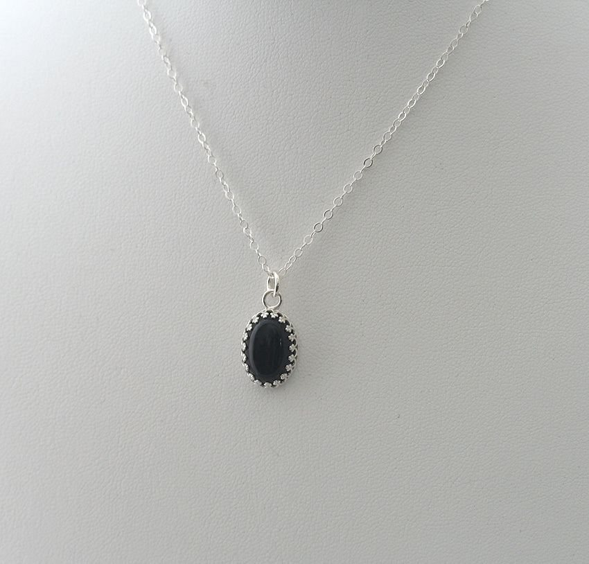 Oval black onyx crown necklace in sustainable sterling silver. Handmade in New Jersey, US.