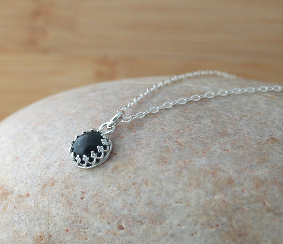 Minimalist black onyx princess crown pendant necklace in sustainable sterling silver. Handmade in New Jersey, US.