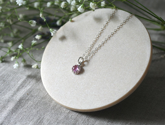 Small pink sapphire princess crown necklace in sustainable sterling silver. Ethical. Handmade in New Jersey, US.