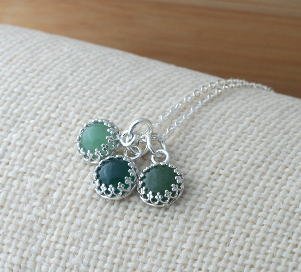 Green gemstone crown pendants in sustainable sterling silver. Aventurine, green onyx, jade. 