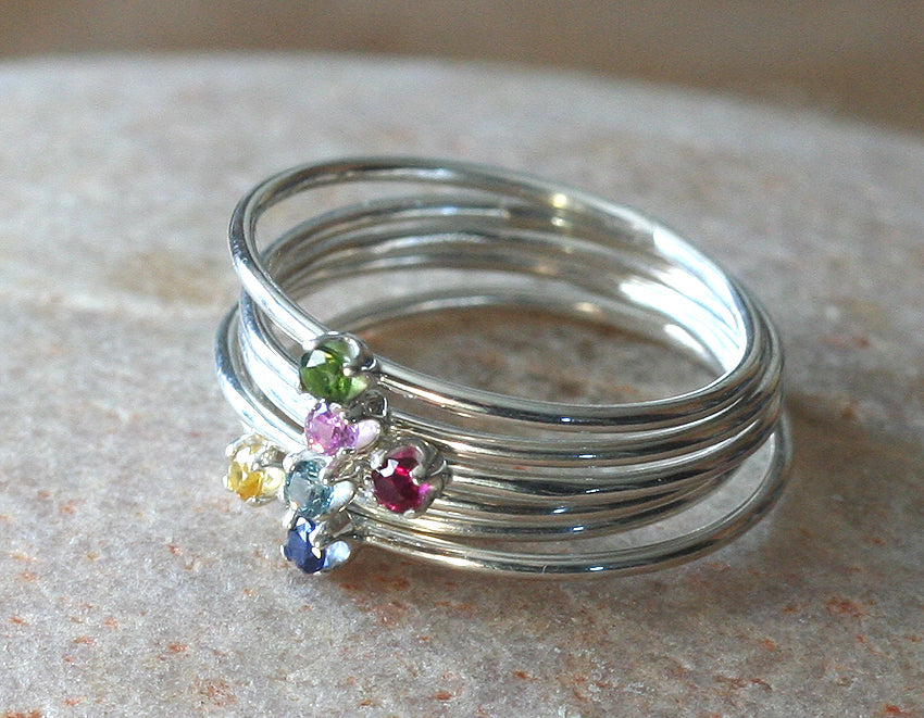 Thin faceted birthstone stacking rings in sustainable silver. Handmade in New Jersey, US.
