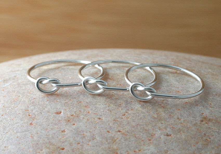 Knot love rings in sustainable sterling silver