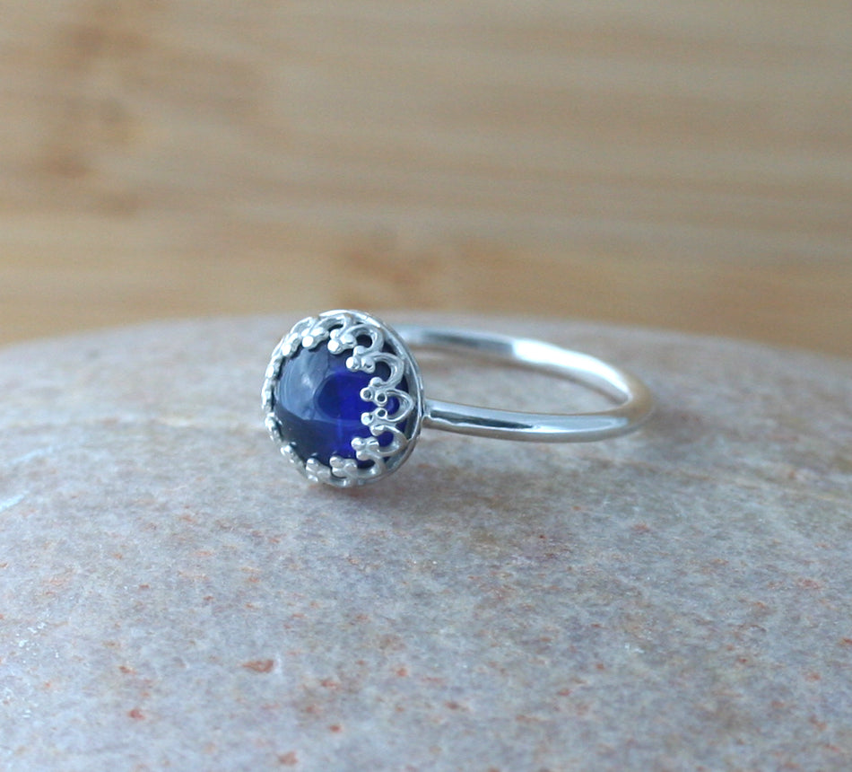 Ethical blue sapphire crown ring in sterling silver. Handmade in the US.