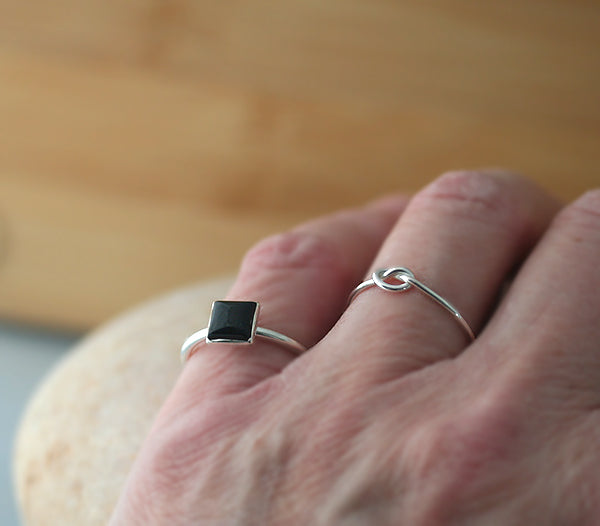 Ethical square black onyx stacking ring and knot love ring in all sizes. Sterling silver. Minimalist design. Handmade in the US with sustainable silver.