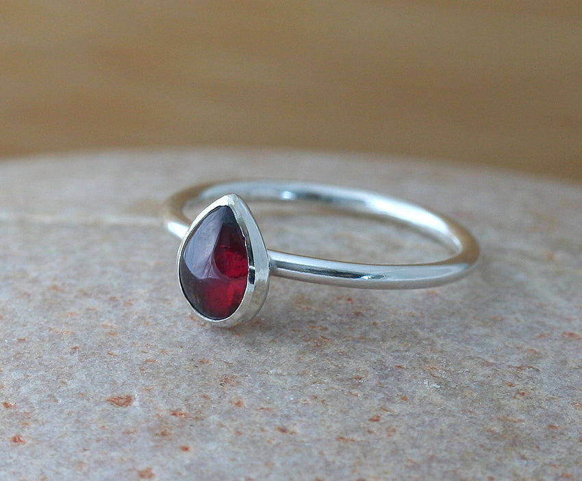 Garnet tear drop ring in sterling silver. Handmade with ethical sterling silver in New Jersey, US.. Hygge garnet ring.