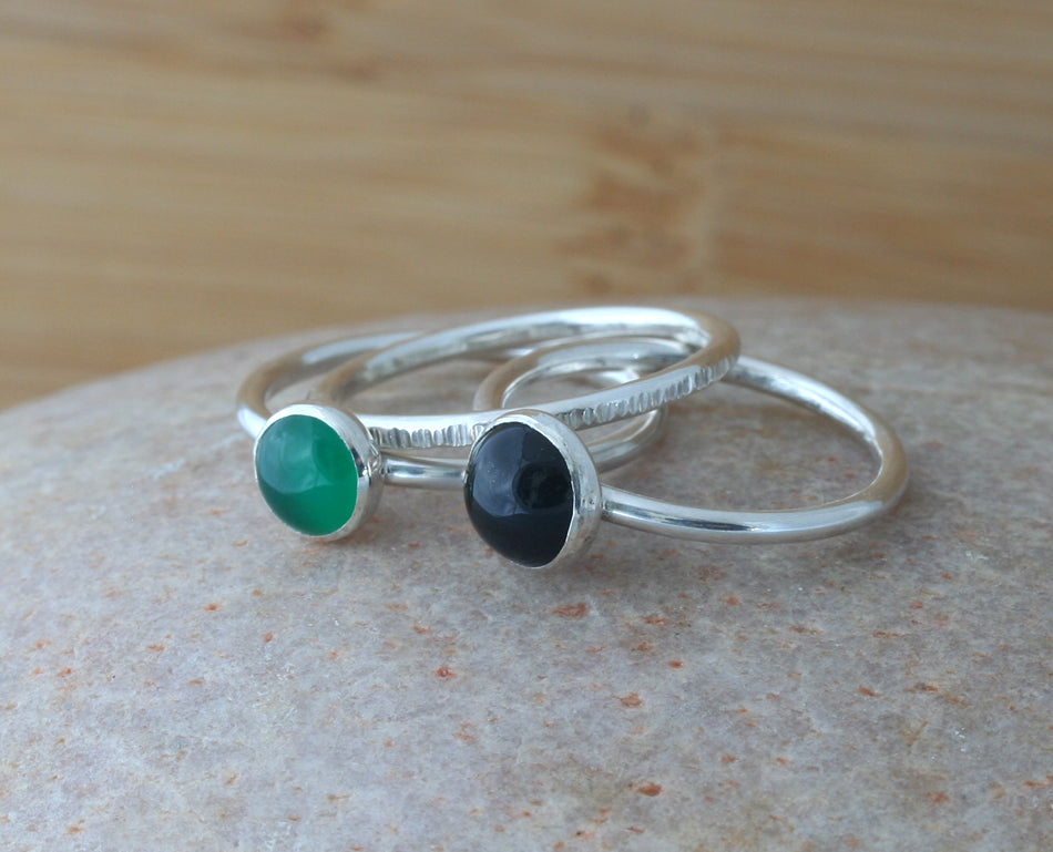 Green onyx, tree bark, and black onyx stacking rings in sustainable sterling silver. Handmade in New Jersey, US.