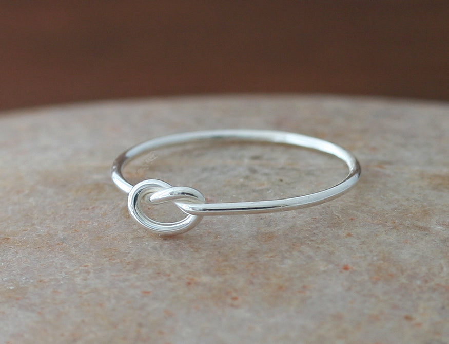 Knot love ring in sustainable sterling silver