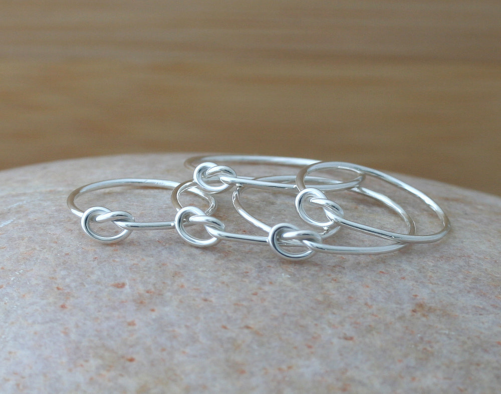 Knot love rings in sustainable sterling silver