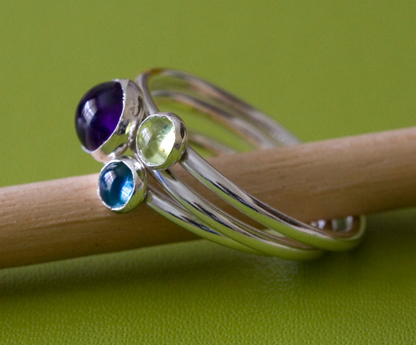 Garnet, amethyst, and topaz stacking ring. Sterling silver. Handmade in the US with sustainable silver.