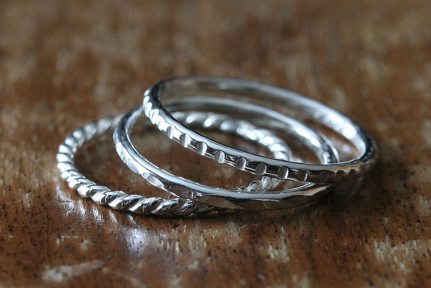 Handmade textured stacker rings made with sustainable silver. Handmade in New Jersey, US.