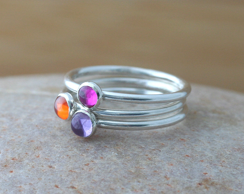 Orange, ruby, alexandrite birthstone stacking rings in sustainable sterling silver. Handmade in New Jersey, US