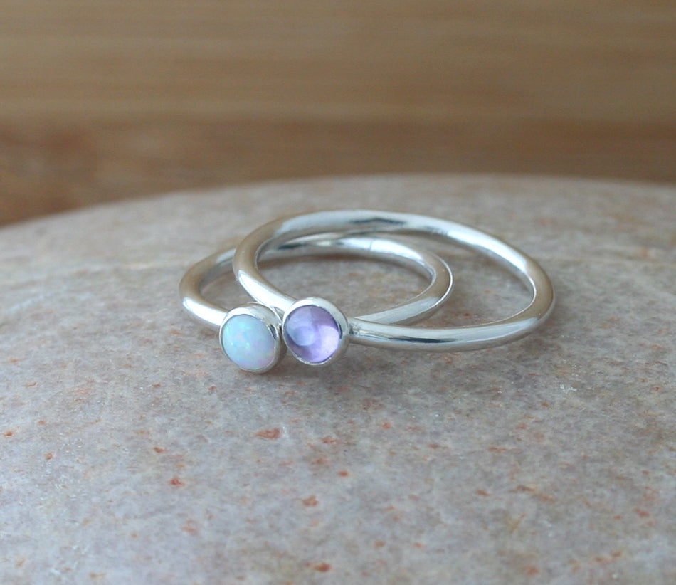 Light amethyst and opal ethical stacking rings in sterling silver. Handmade in the US.