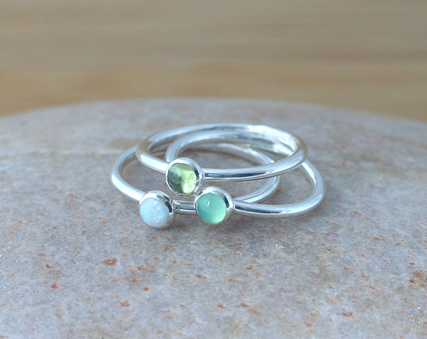 White opal, chrysoprase, and peridot stacking rings handmade in New Jersey, US., with ethical silver.