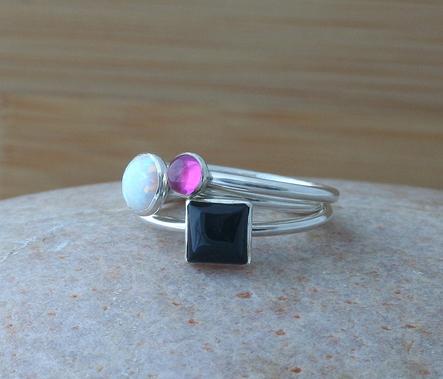 Opal, pink sapphire and black onyx stacking rings. Handmade in New Jersey, US. with ethical silver.