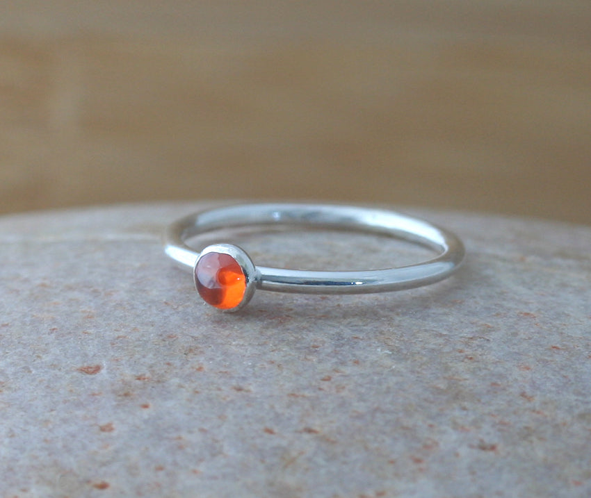 Orange cubic zirconia stacking ring in all sizes. Ethical minimalist Scandinavian design. Handmade in New Jersey.
