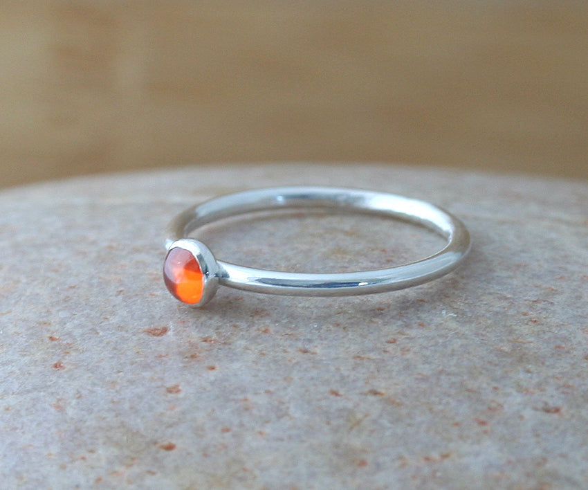 Orange cubic zirconia stacking ring in all sizes. Ethical minimalist Scandinavian design. Handmade in New Jersey.