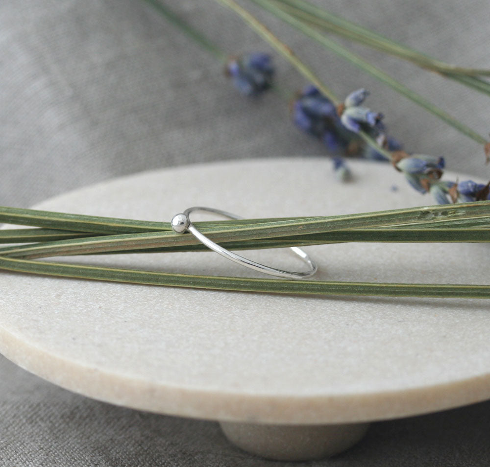 Thin pebble stacking ring in sustainable sterling silver. Handmade in New Jersey, US.