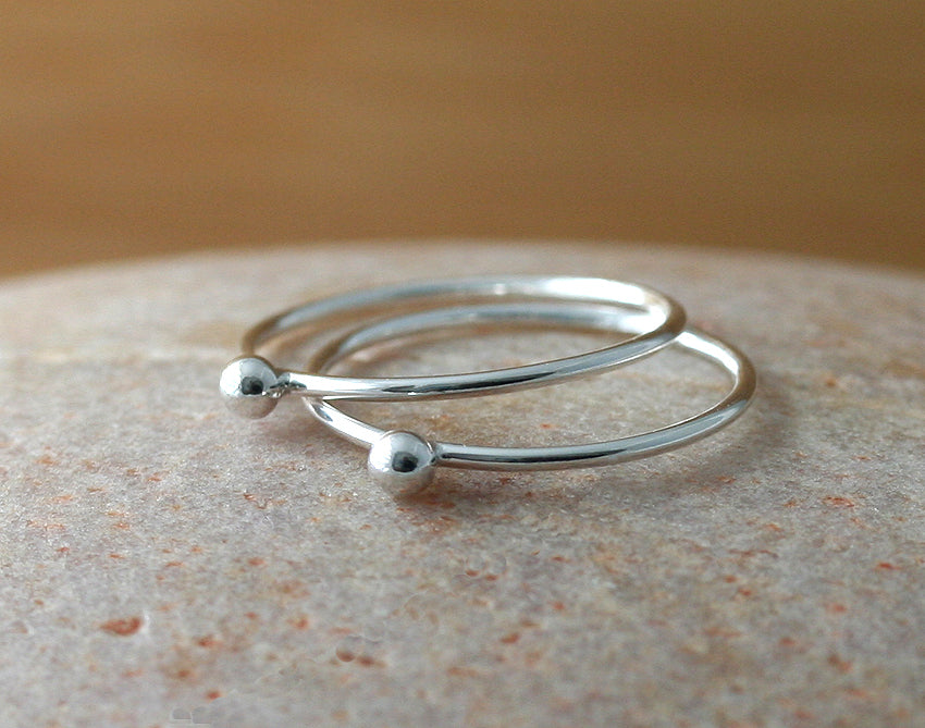 Pebble rings made in New Jersey, US, with sustainable sterling silver. Dainty, minimalist midi rings.