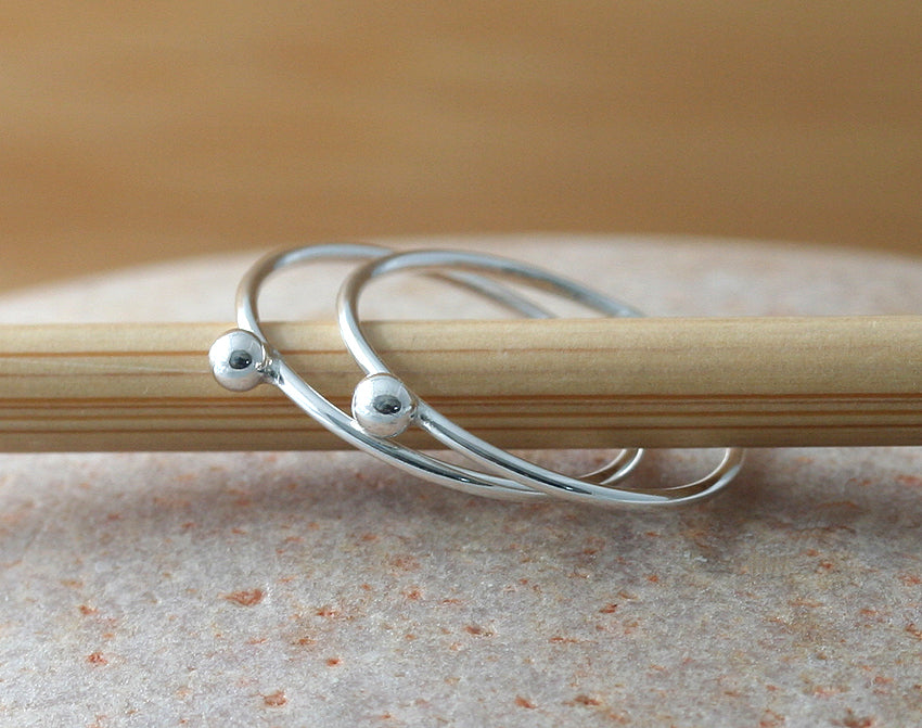 Pebble rings made in New Jersey, US, with sustainable sterling silver. Dainty, minimalist midi rings.