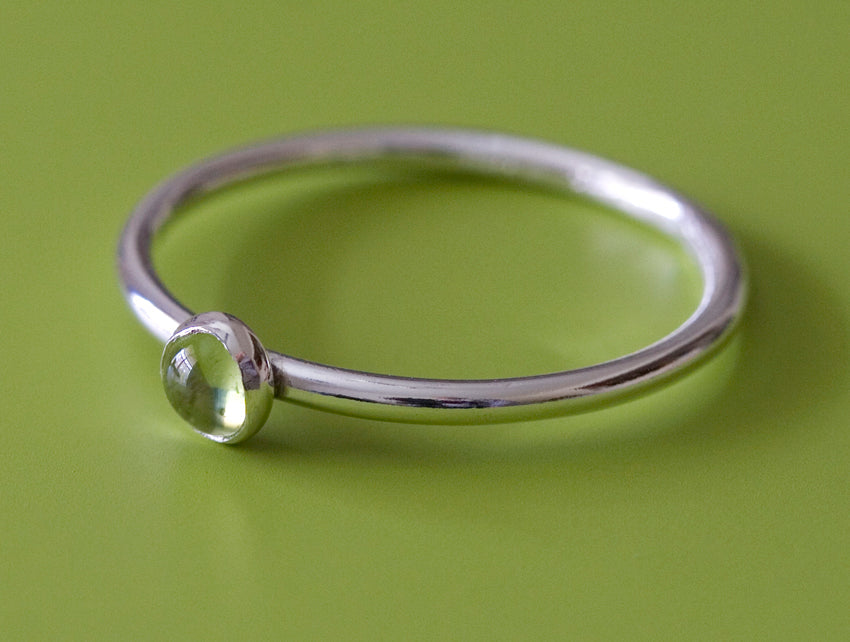 Peridot stacking ring. Sterling silver. Handmade in the US with sustainable silver.