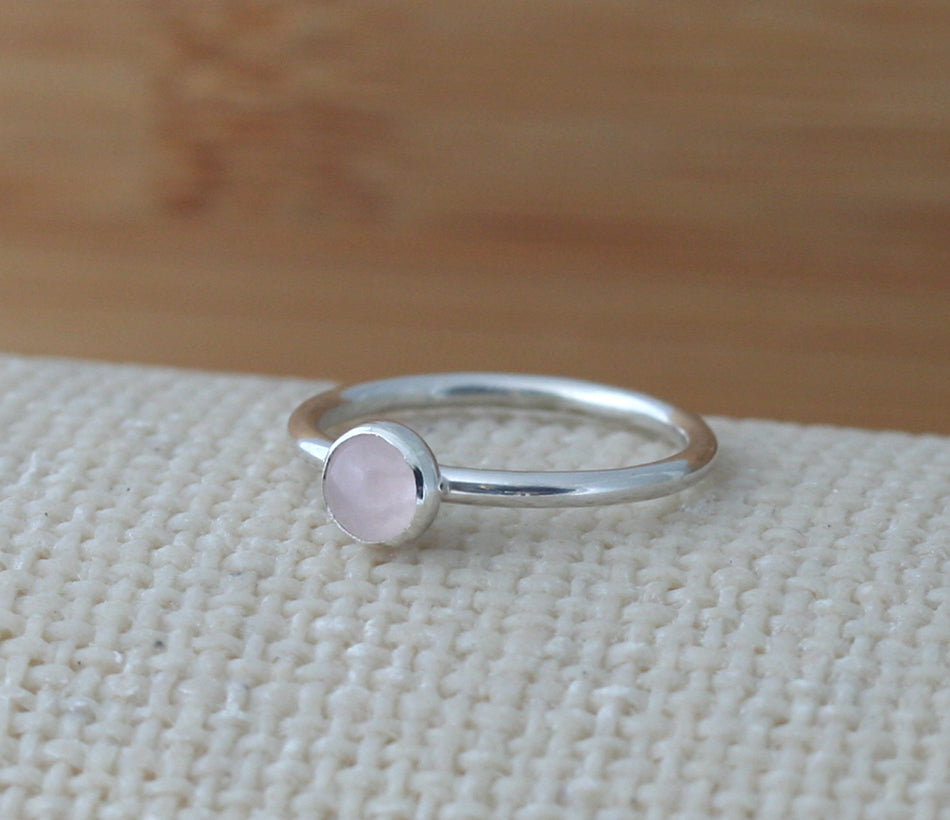 Small rose quartz stacking ring in all sizes. Sterling silver. Minimalist design. Handmade in the US with sustainable silver.