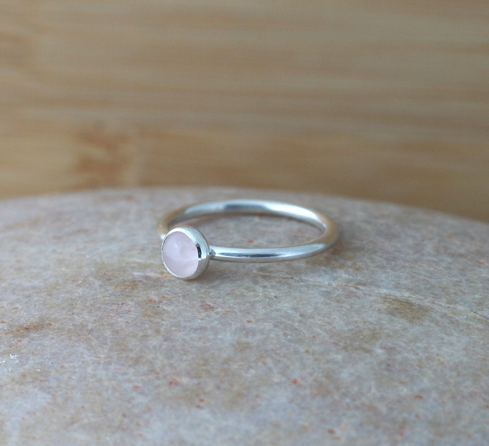 Small rose quartz stacking ring in all sizes. Sterling silver. Minimalist design. Handmade in the US with sustainable silver.