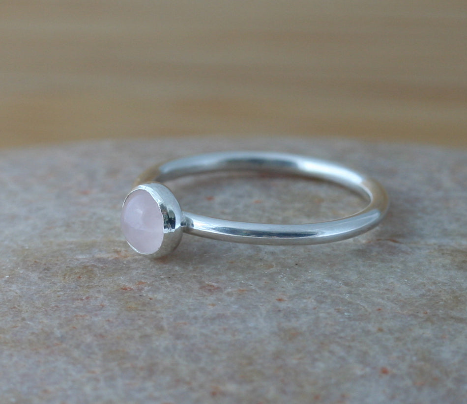 Small rose quartz stacking ring in all sizes. Sterling silver. Minimalist design. Handmade in the US with sustainable silver.