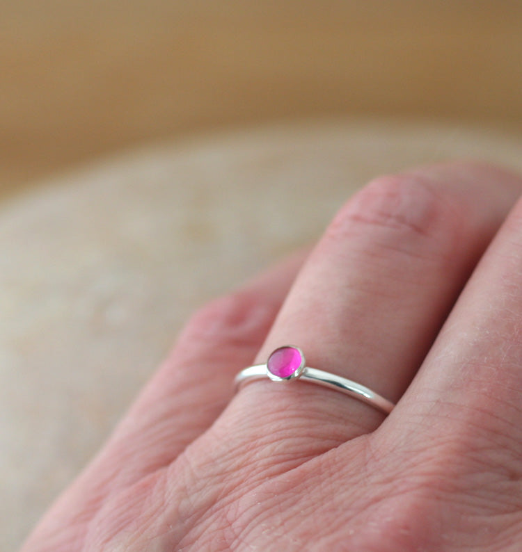 Ruby stacking ring on figner in sustainable sterling silver. Ethical ring. Handmade in New Jersey, US.