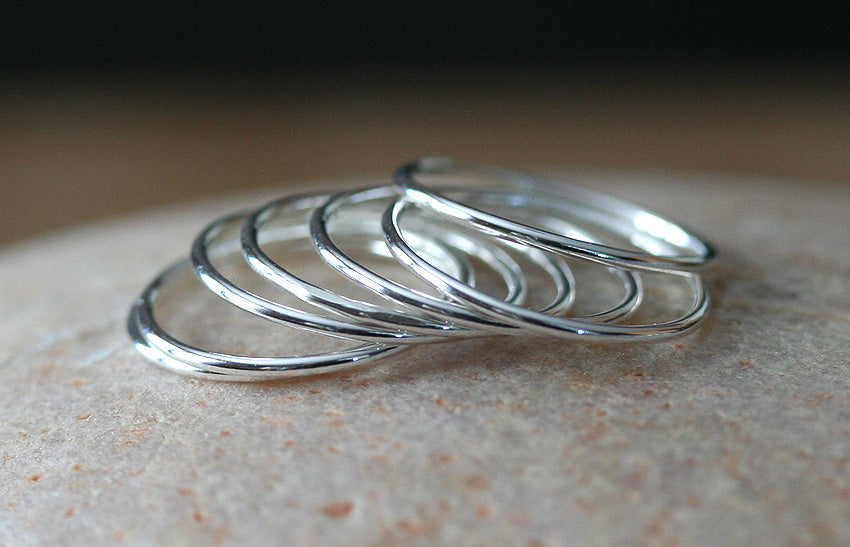 Thin stacking rings in sustainable sterling silver. Handmade in New Jersey, US.