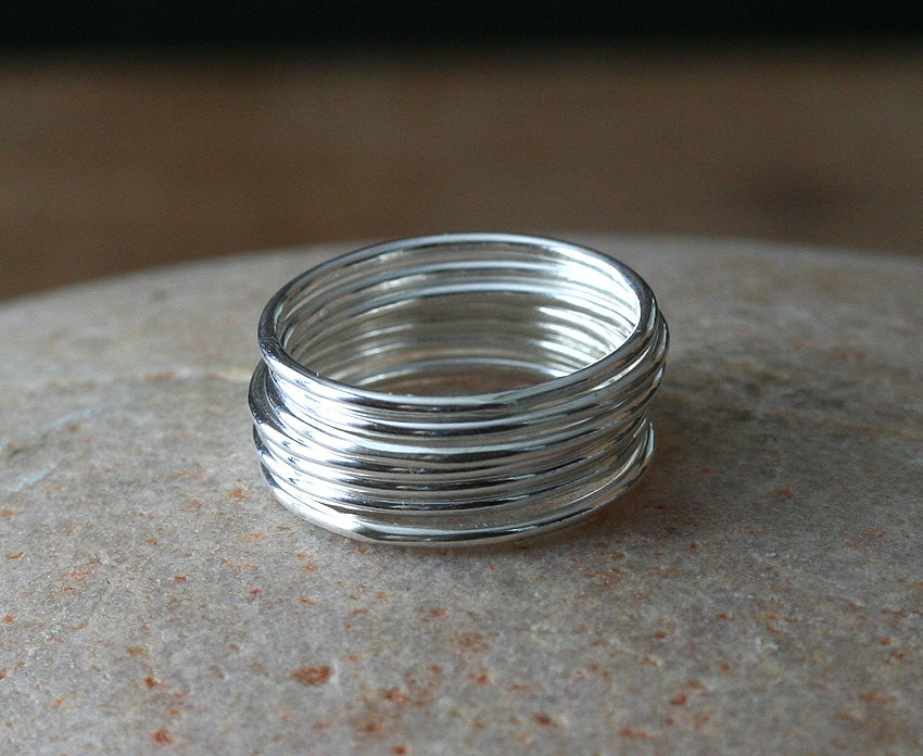 Thin stacking rings in sustainable sterling silver. Handmade in New Jersey, US.