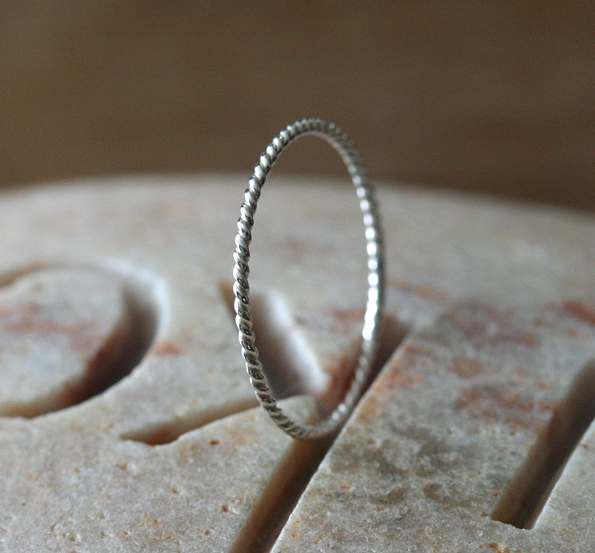 Thin twisted stacking ring in sustainable sterling silver. Handmade in New Jersey, US.