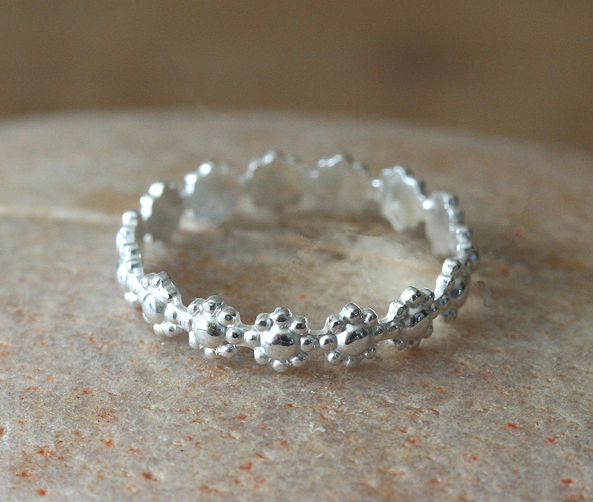 Daisy flower ring in sustainable sterling silver. Handmade in New Jersey, US.