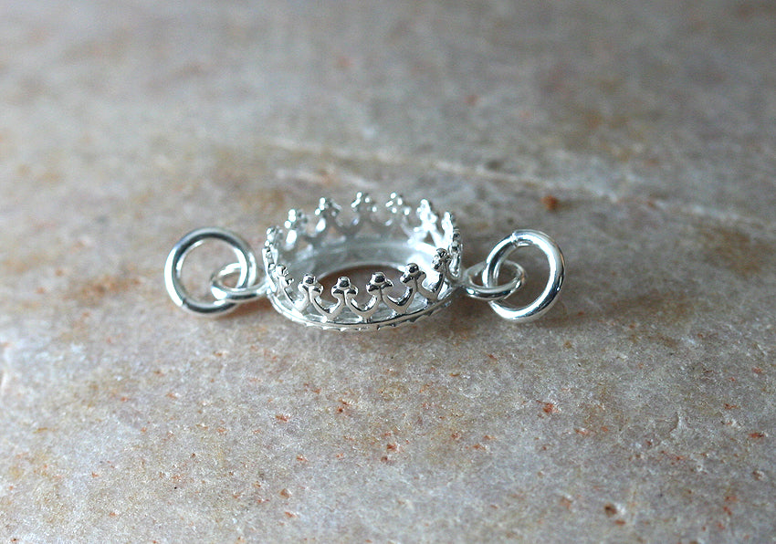 Oval crown princess bezel cup pendant in sustainable sterling silver with jump rings. 8 x 10 mm. Jewelry blank supplies.